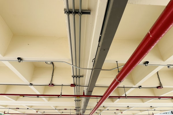 Commercial electrical conduit installation on ceiling